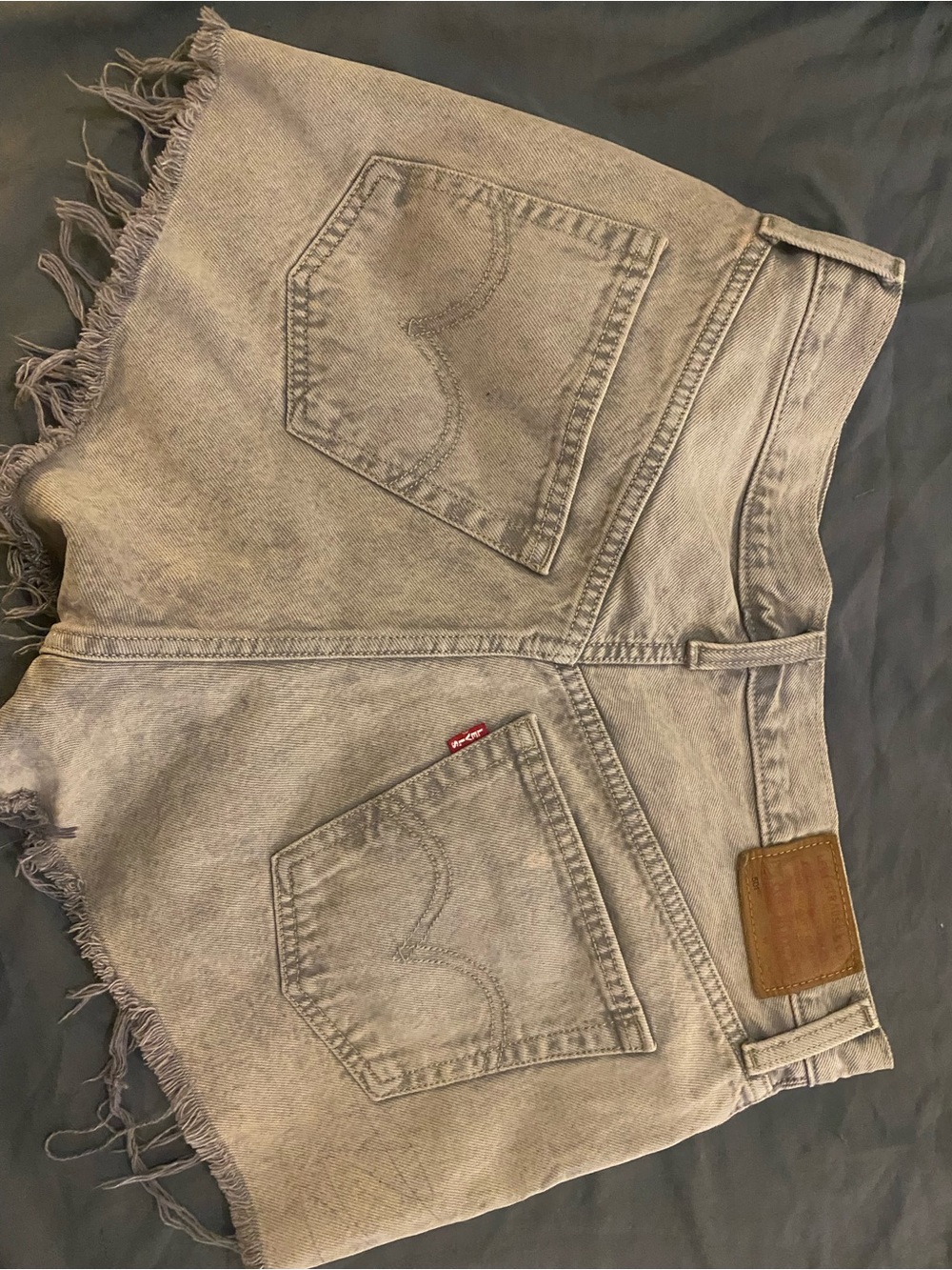 Levi's Light Gray Frayed Denim Cutoff Shorts